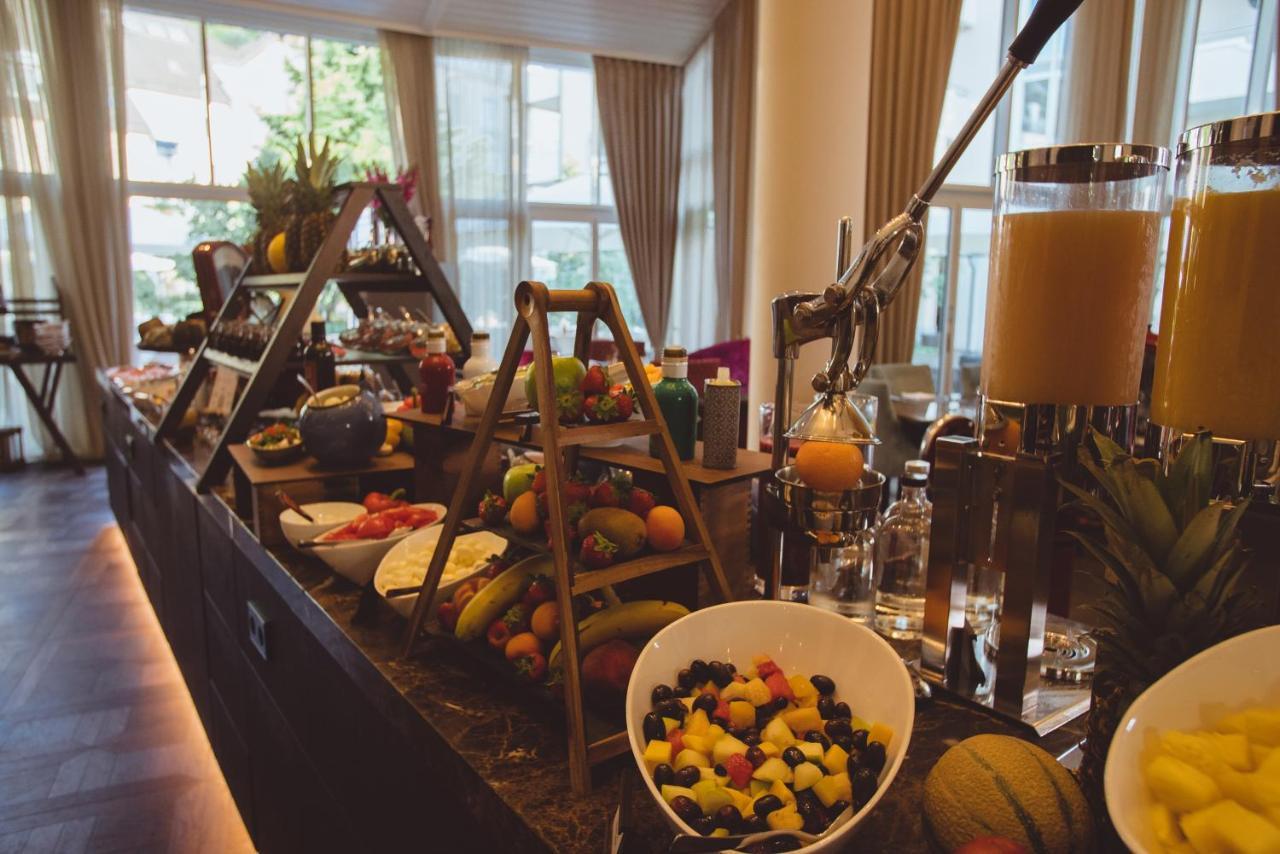 Vila Vita Rosenpark Marburg Exterior photo A fruit salad at a buffet